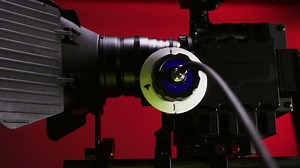 Red Camera against a red background - Free Stock Video