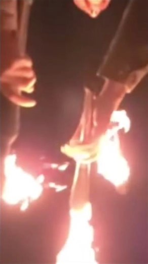 "Playing with Fire: The Art of Juggling Flames 🔥✨"