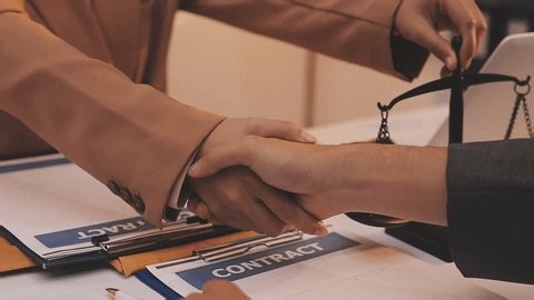 clip-3988821653-lawyer-explained-client-about-law-that-must