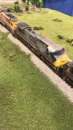 CSX YN2 with UP SD70 hopper train