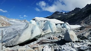 glacier covered with protection planked to stop melting process. global climate change background.