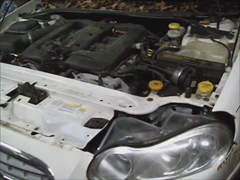 Chrysler Concorde `03 w 3.5l H.O. timing belt and water pump remove pt1