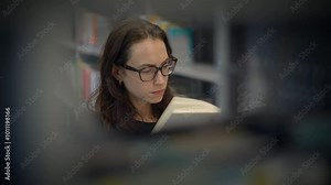 A Focused Reader Immersed in the Practice of Reading Within a Modern Library Environment and Setting