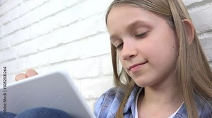 Child Playing Tablet Browsing Internet, Kid Using Touchscreen Device, Blonde Girl Writing Reading Messages, Teenager Online Gaming