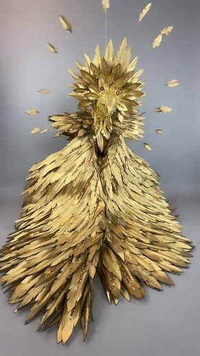 The Gold Phoenix rises — rebirth, fire, and radiance in motion. ✨ I’m still working on it🤓 Hopefully finish this week! ⭐️ #WearableSculpture #GoldPhoenix #LivingArt | Kikimora Studio
