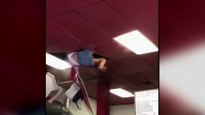 Woman falls through restaurant's ceiling after asking to use restroom