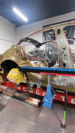 Tesla mounted on a Celette Sevenne frame machine with the side gantry
