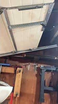 Installation of Roof pitch track on 9x7 clopay garage door woodridge,il
