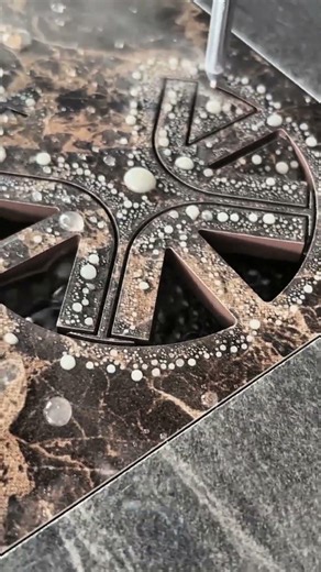 How Waterjet Cutting Works: Precision Shapes in Brown Marble