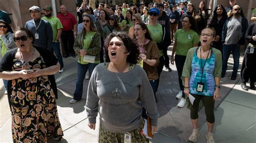 Rallying CA state workers have a message for Gavin Newsom on return-to-office