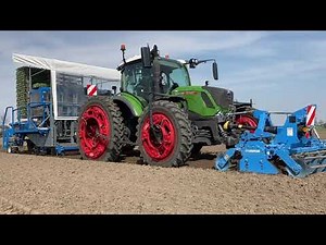 Special Fendt 314 Profi+ with OC Group track width extensions, planting broccoli seedlings.