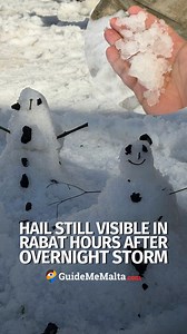 Unusual scenes in Rabat as traces of hail remained hours after the storm, with people of all ages stopping to enjoy the rare sight ❄️ Did you get to see it too? #GuideMeMalta #Rabat #Snow #Malta | GuideMeMalta.com