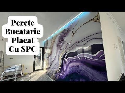 An entire wall clad in decorative SPC panels. A luxury kitchen.