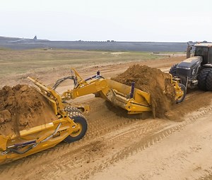 294K views · 3.1K reactions | Watch Envision Contractors LLC push load two K-Tec 1228 scrapers in one minute with a K-Tec Ox Block!  | K-Tec Earthmovers | Facebook