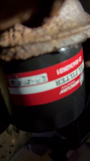 Oil filter location on a boat inboard out board