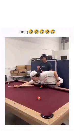 I am facts on Instagram: "The post shares a 21-second video of two friends engaging in a lively pool game on red-felt tables in a warehouse-like setting, featuring dynamic shots and playful banter that capture casual camaraderie.it quickly garnered 73,000 views and 430 likes, driven by the relatable humor of exaggerated pool tricks and near-misses. Viewer replies in Indonesian emphasize the players' skill ("jago") and lighthearted "cheating" moments ("curang"), underscoring the video's appeal as