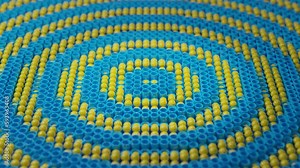 Loop 3d animation of an array of pipes and spheres. Smooth undulating motion of spheres and cylinders from the center to the edge. Beautiful continuous animation of wave and pulse motion.