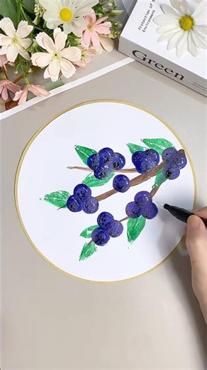 Learn how to create fruit clusters using a simple sponge dabbing technique and a leaf stencil.