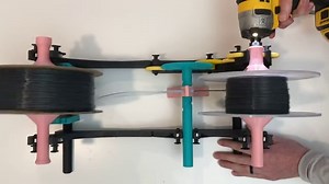 I designed a filament winder that transfers a full kilo in less than 2 minutes! Link in the comments