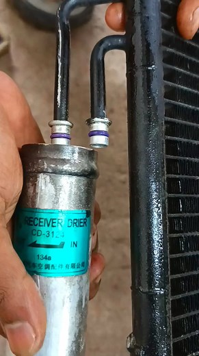 AC condenser receiver drier feeding #ac #condenser #receiver #drier #mechanic #automotive #engine #automobile #fblifestyle | Hybrid Repair Service & Car A.C Service