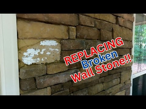 Reattaching stacked stone on wall: Easy way to remove old mortar.