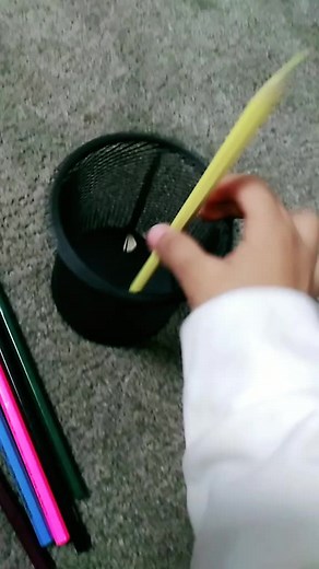 Organizing Colored Pencils in a Wire Basket