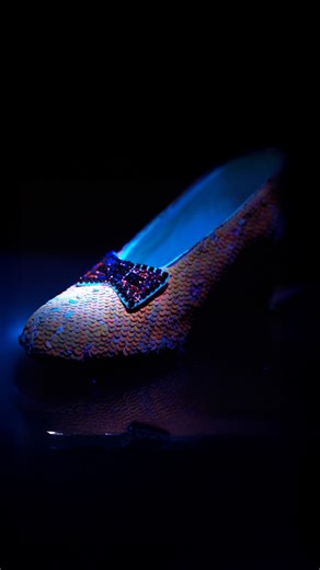 Academy Museum on Instagram: "A little UV light, a lot of Oz magic! Objects Conservator Sophie reveals the ruby slippers from ‘The Wizard of Oz’ (1939) as you’ve never seen them, bringing hidden details and remarkable craftsmanship to light. Don’t miss them on display starting December 20th!"