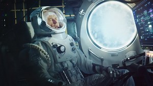 Astronaut Sitting Inside a Space Rocket During Take Off. Successful Rocket Launch Sending Space Ship into Space. Cosmonaut Experiencing G-Force and Vibrations Inside Capsule. Clouds Pass in Porthole.