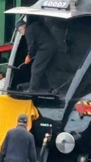 The Crew Cleaning Out Sir Nigel Gresley After A Day Working On The Watercress Line