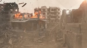 Palestine city destroyed after bombing. Ruins and house in a fire. Huge explosion on horizon. ash covers destroyed buildings