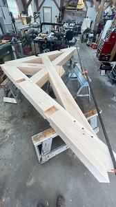 Test fit ✅ I’ve only done one scissor truss before but it didn’t have a king post so it was a lot easier. This one was small, but very challenging and super fun. Can’t wait to see it vertical. #roofframing #timberporn #coolshit #timberframe #builtnotbought #buildersofig #design #details #skilledtrades #woodwork | Jeff Kelley