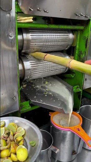 Sugarcane juice squeezing technique. #shorts