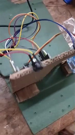 Automatic door open system using ultrasonic sensor with servo motor