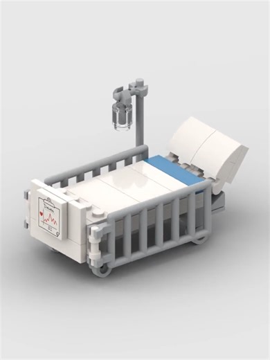 A detailed hospital bed build with clean lines and realistic proportions, featuring side rails, an adjustable headrest, wheels, and an IV stand. A perfect addition to hospitals, clinics, or emergency scenes—simple, recognizable, and instantly readable in any city layout. #LEGO #LEGOMOC #HospitalMOC #CityMOC #MedicalBuild #AFOL #StreetDetails