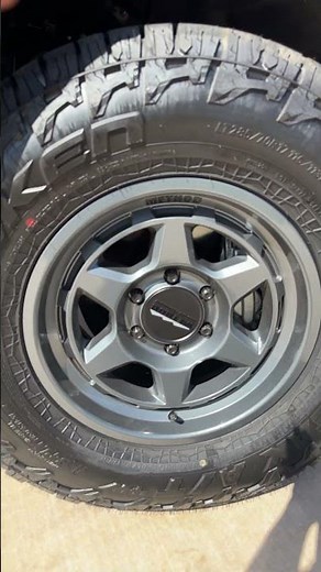 285 70 R17 Falken Wildpeak A/T 4Ws on Method MR708 bead-grip wheels in gloss titanium 17x8.5 +25mm