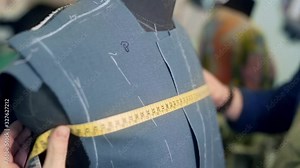 measure the length of the jacket shoulders Stock Video