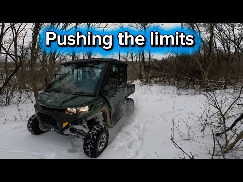CAN-AM Defender HD 9 playing in the snow, work or Play Machine