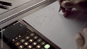 Resolving a math/physics problem onto paper.