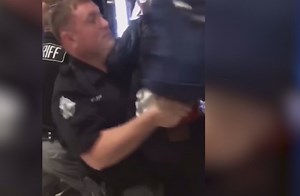 Video shows cop choke and body-slam 14-year-old over a candy bar