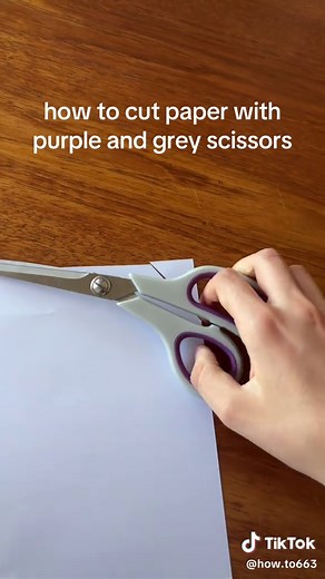 How to Cut Paper Using Purple and Grey Scissors