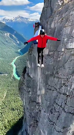 Scary Physics: Sliding Off a Cliff into an Angled Airbag