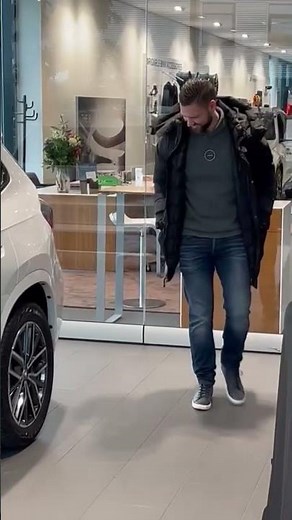 Delivery of the new BMW iX1 in mineral white with m-sports pack