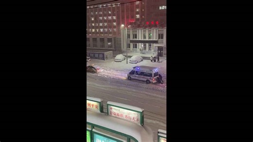 Paramedics get out carry patient when ambulance becomes stuck in snow