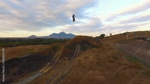 Extreme Freestyle Motocross Jumping on ramp aerial view 4k
