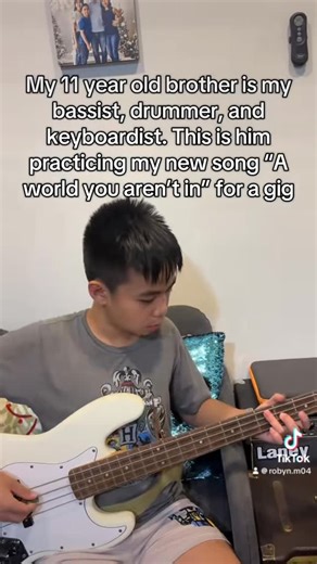 Robyn M on Instagram: "This is my brother Jonah, the bassist, drummer and keyboardist. Here he is practicing my new song “A World You Aren’t In”. We are playing it for the first time as a full band tonight in @saguijobar ! Our set starts at 930pm. See you! #musicians #bass #bassist #music #talentedkid"