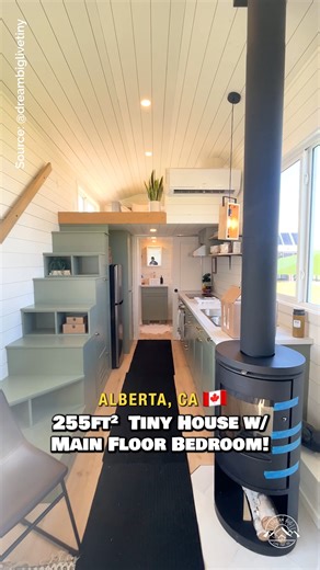 Welcome to the 30' "Margo" tiny house on wheels built by Canadian-based Teacup Tiny Homes 🇨🇦 Inside, there is a spacious floor plan with a main-level bedroom (featuring a murphy bed that converts from a bed into an office space), a living area with space for a couch & a wood stove, a galley kitchen with apartment-size appliances & tons of storage, a full bathroom with an incinerating toilet & shower, a washer & dryer, & a lofted bedroom/flex space! Would you live in this tiny home? #tinyhouse 