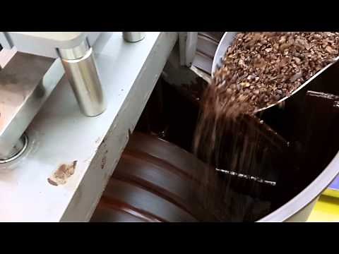 How chocolate is made on stone grinder melanger from cocoa nibs