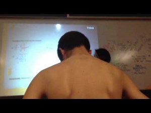 Kid takes off shirt during class.