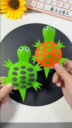 Craft an adorable paper turtle! 🐢 So easy and fun to make with just paper and googly eyes.