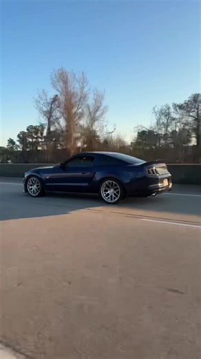 rear end fitment looking not so bad with the new tires #carsoftiktok #s197 #konablue #rollers #mustang @charcoal.5.0 cam car @Ew roller demon